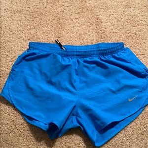 Blue Nike DRI-FIT running shorts